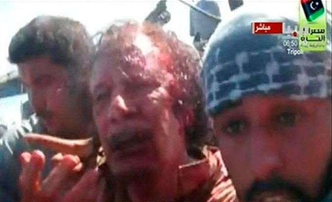 Khadafi diarak keliling kota sebelum dibantai
